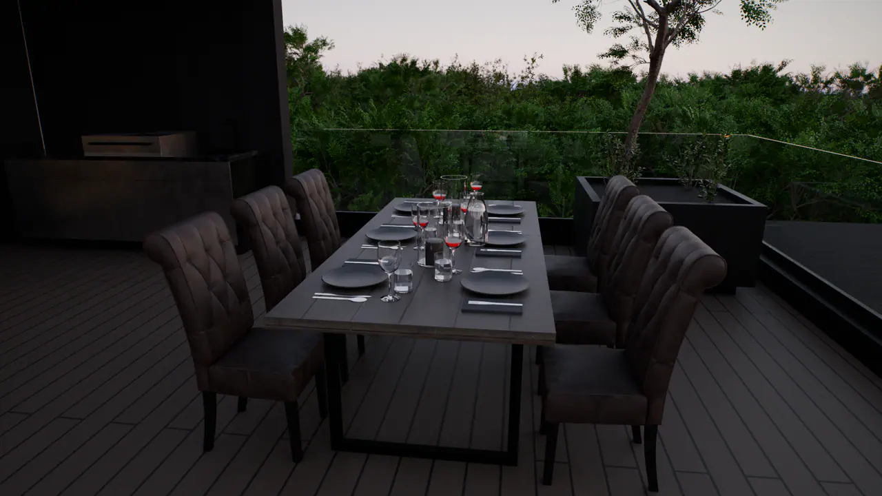 The outdoor dining table in the roof terrace of the Family House, in a frame of its walk.